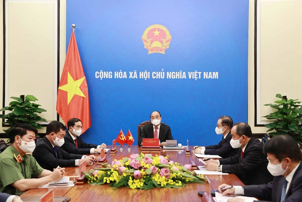 Chủ tịch nước Nguyễn Xuân Phúc điện đàm với Tổng Bí thư, Chủ tịch Trung Quốc Tập Cận Bình. (Ảnh: Thống Nhất/TTXVN)
