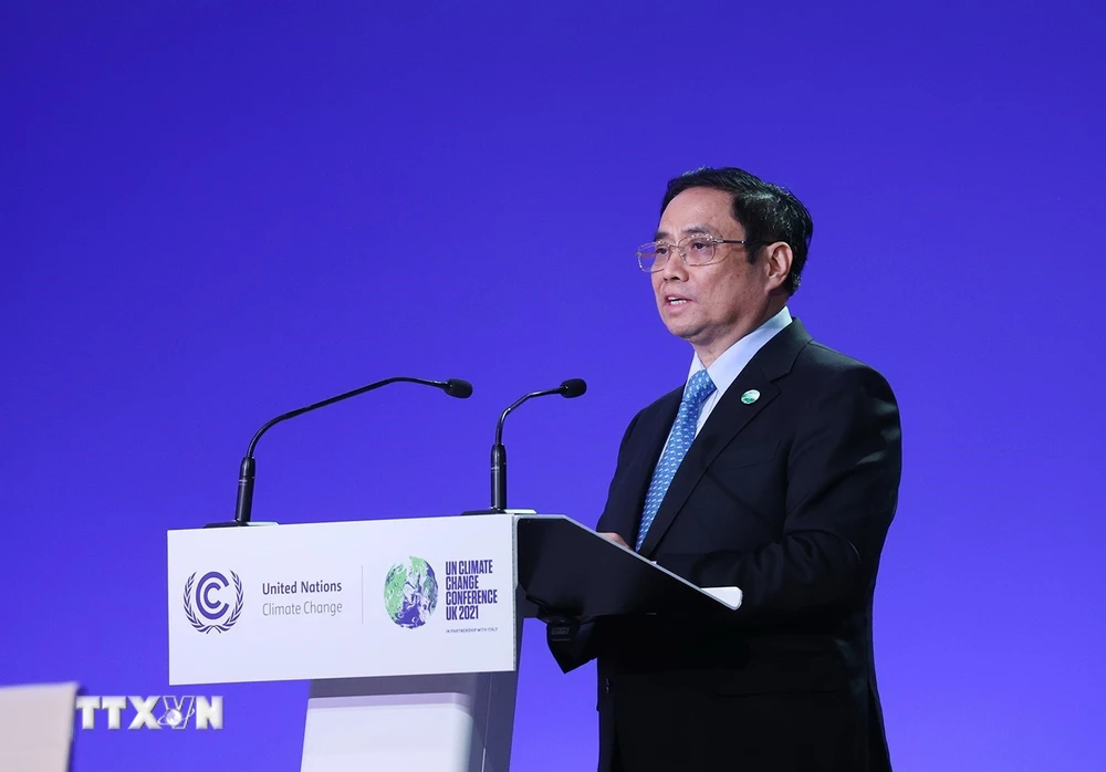 Thủ tướng Phạm Minh Chính phát biểu tại Hội nghị Thượng đỉnh Khí hậu trong khuôn khổ Hội nghị lần thứ 26 các Bên tham gia Công ước khung của Liên hợp quốc về Biến đổi khí hậu (COP26) năm 2021. (Ảnh: Dương Giang/TTXVN)