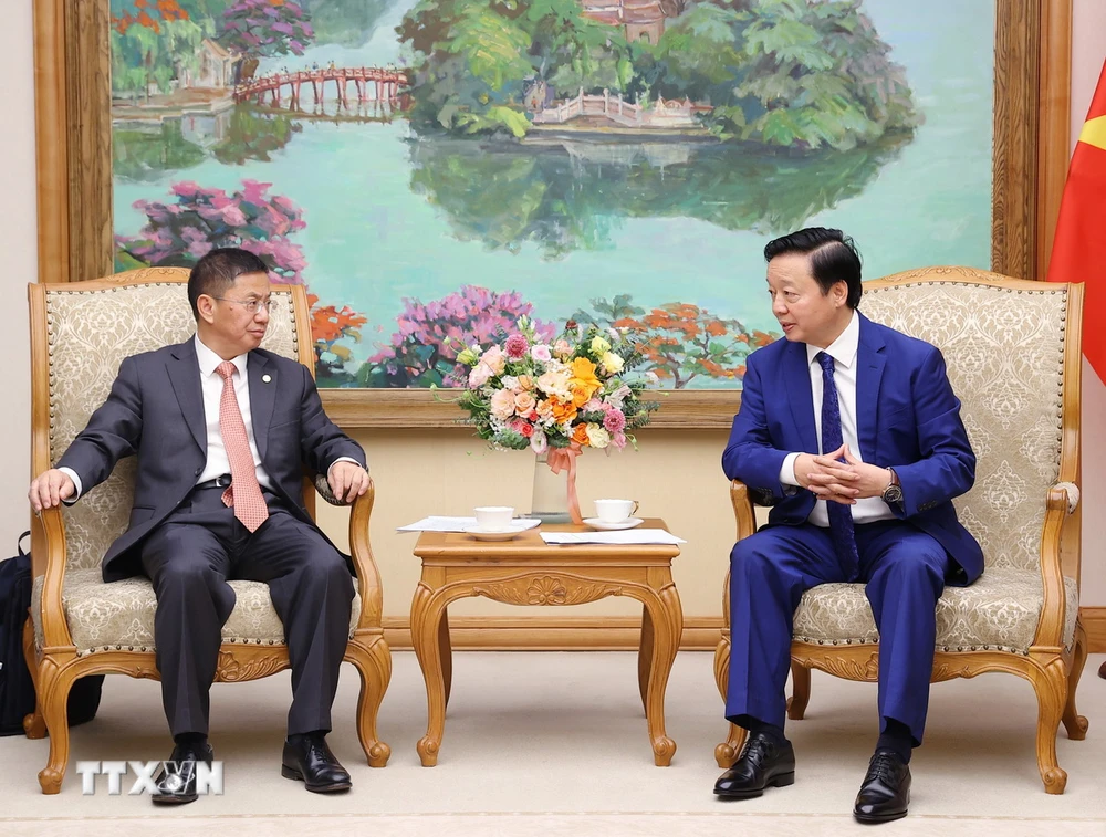 Phó Thủ tướng Trần Hồng Hà tiếp ông La Tất Hùng, Chủ tịch Hội đồng quản trị Tập đoàn Tư vấn Công trình Điện lực Trung Quốc. (Ảnh: Văn Điệp/TTXVN)