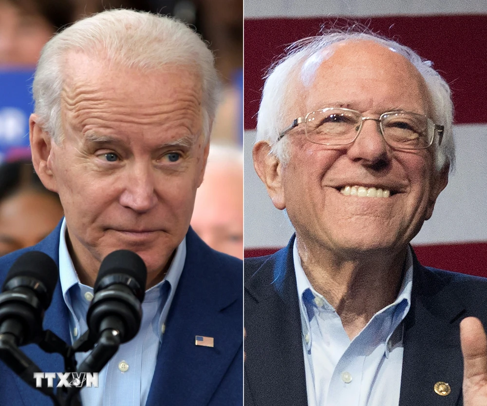 Cựu Phó Tổng thống Mỹ Joe Biden (trái) và ứng viên tranh cử tự do, Thượng nghị sỹ Bernie Sanders. (Ảnh: AFP/TTXVN)