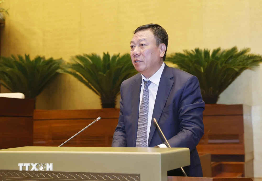 Tổng Thanh tra Chính phủ Đoàn Hồng Phong trình bày Báo cáo về công tác tiếp công dân, giải quyết khiếu nại, tố cáo. (Ảnh: Doãn Tấn/TTXVN)