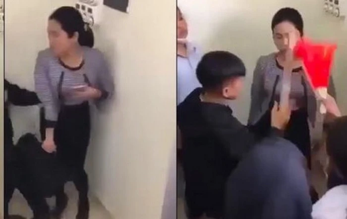 Nhóm học sinh Trường Trung học Cơ sở Văn Phú có hành vi ngỗ ngược đối với giáo viên. (Ảnh cắt từ clip)