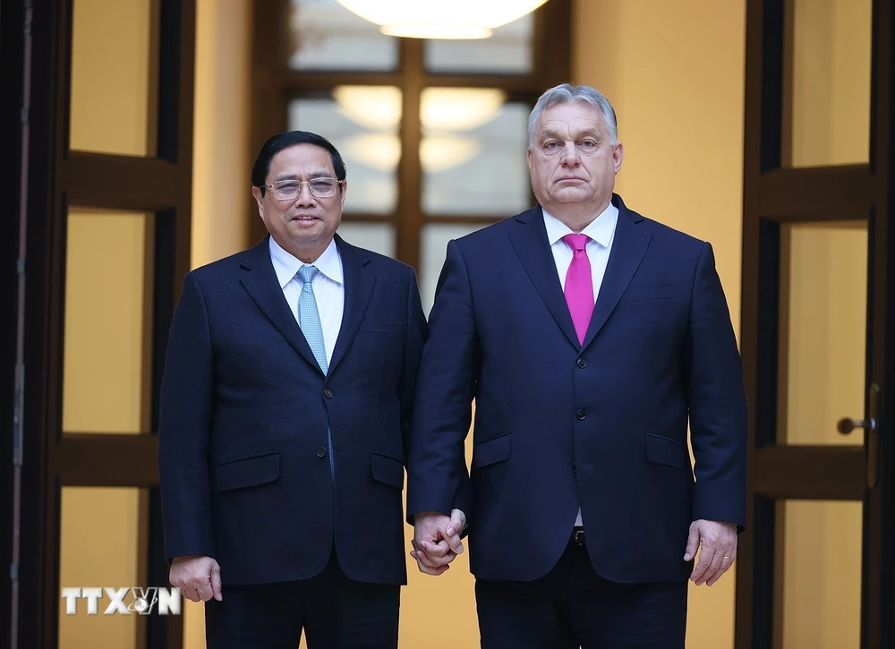 Thủ tướng Phạm Minh Chính và Thủ tướng Hungary Viktor Orbán. (Ảnh: Dương Giang-TTXVN)