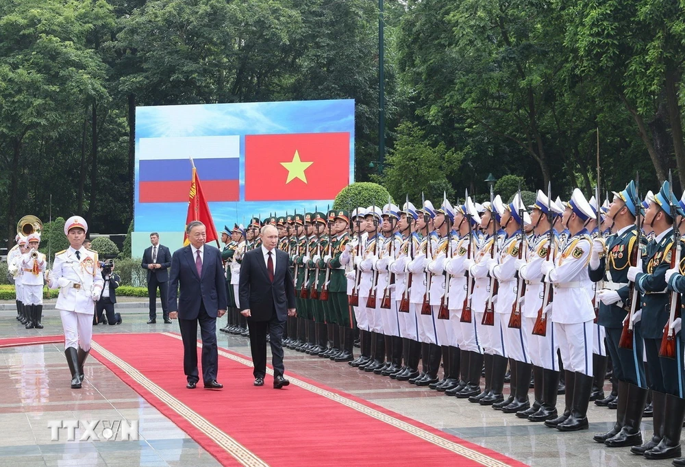 Chủ tịch nước Tô Lâm chủ trì lễ đón chính thức Tổng thống Nga Vladimir Putin- Ảnh 3.