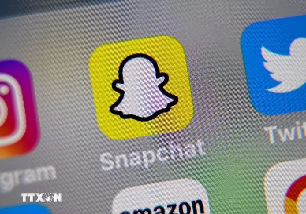 Biểu tượng Snapchat trên màn hình điện thoại. (Ảnh: AFP/ TTXVN)