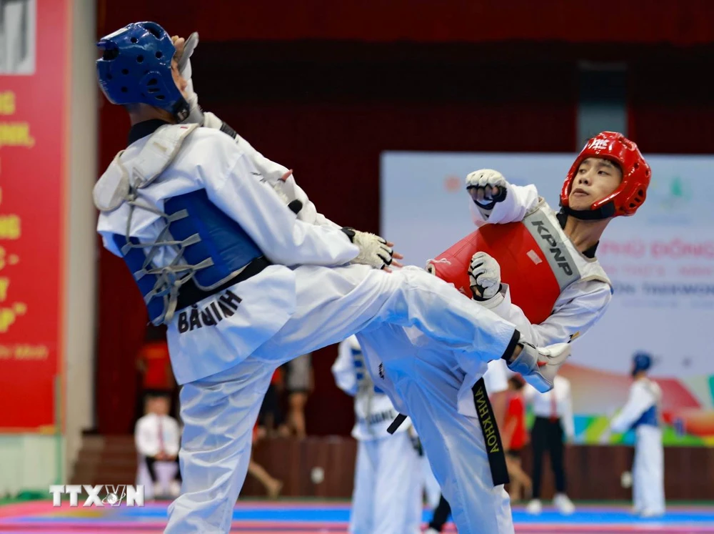 Thi đấu đối kháng môn Taekwondo. (Ảnh minh họa. Thanh Tùng/TTXVN)