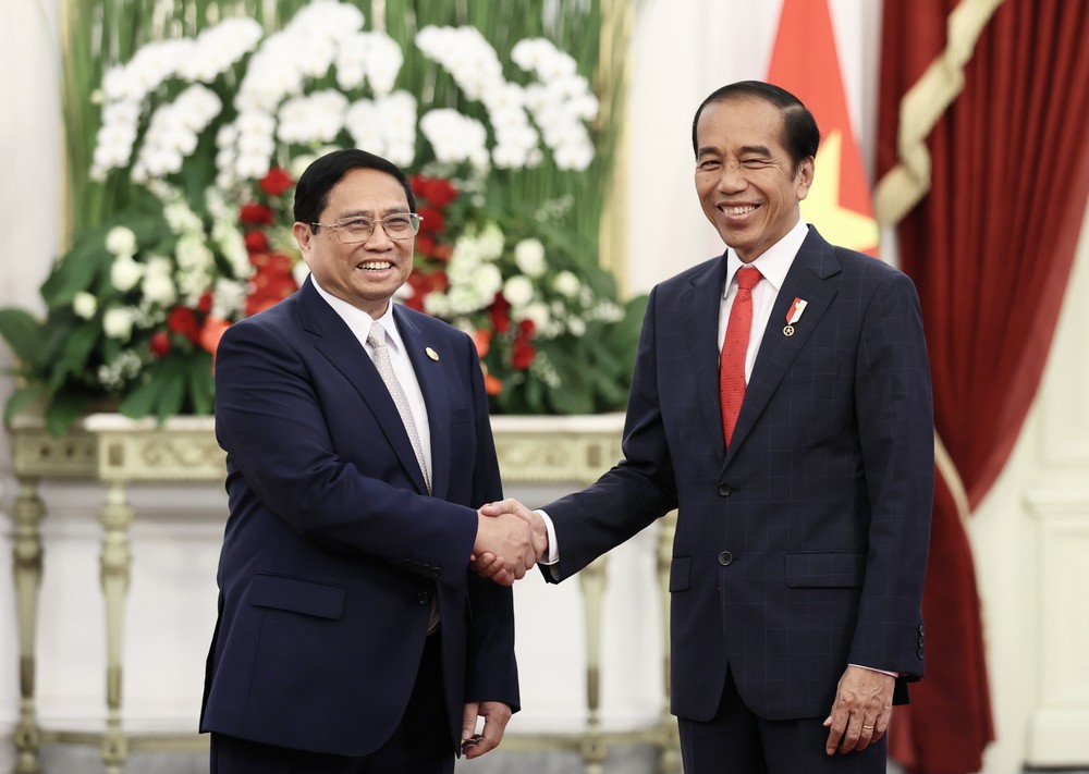 Thủ tướng Phạm Minh Chính hội kiến Tổng thống Indonesia Joko Widodo. (Ảnh: Dương Giang/TTXVN)