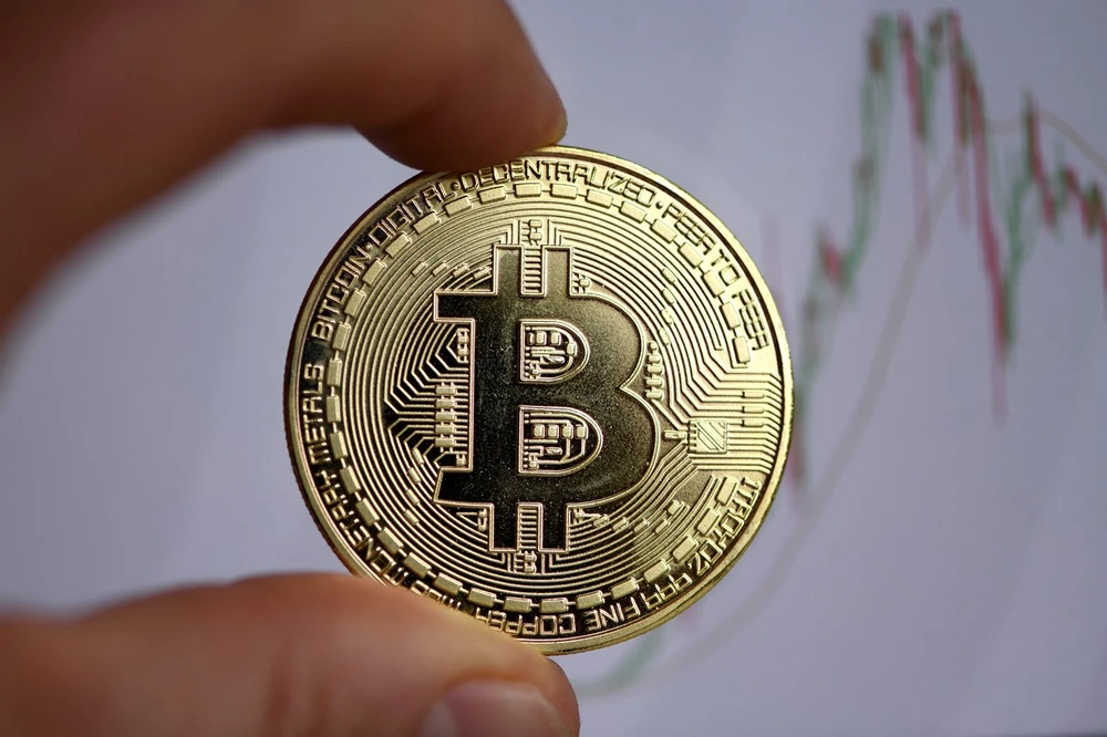 Giá Bitcoin đã vượt ngưỡng 40.000 USD trong phiên giao dịch ngày 4/12. (Ảnh: AFP/TTXVN)