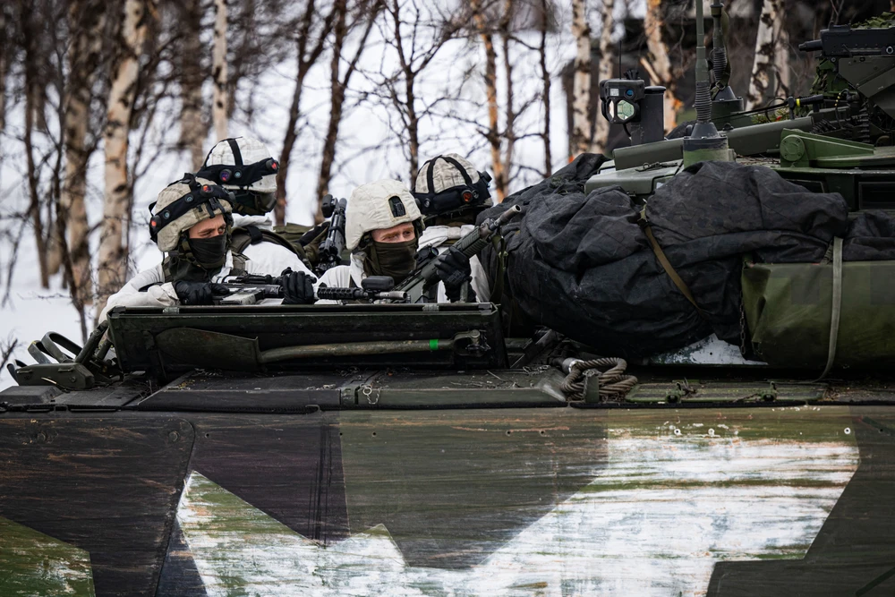 Binh sỹ Thụy Điển tham gia cuộc tập trận đầu tiên trong NATO tại khu vực biên giới giữa Na Uy và Phần Lan, ngày 9/3/2024. (Ảnh: AFP/TTXVN)