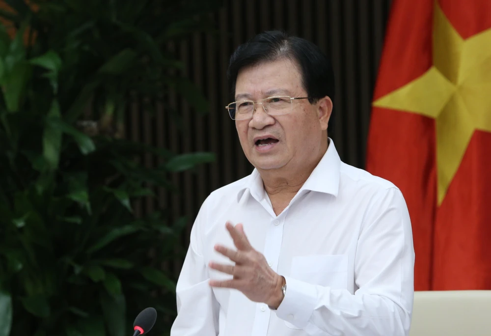 Phó Thủ tướng Trịnh Đình Dũng chủ trì cuộc họp phân vùng quy hoạch. (Ảnh: Dương Giang/TTXVN)