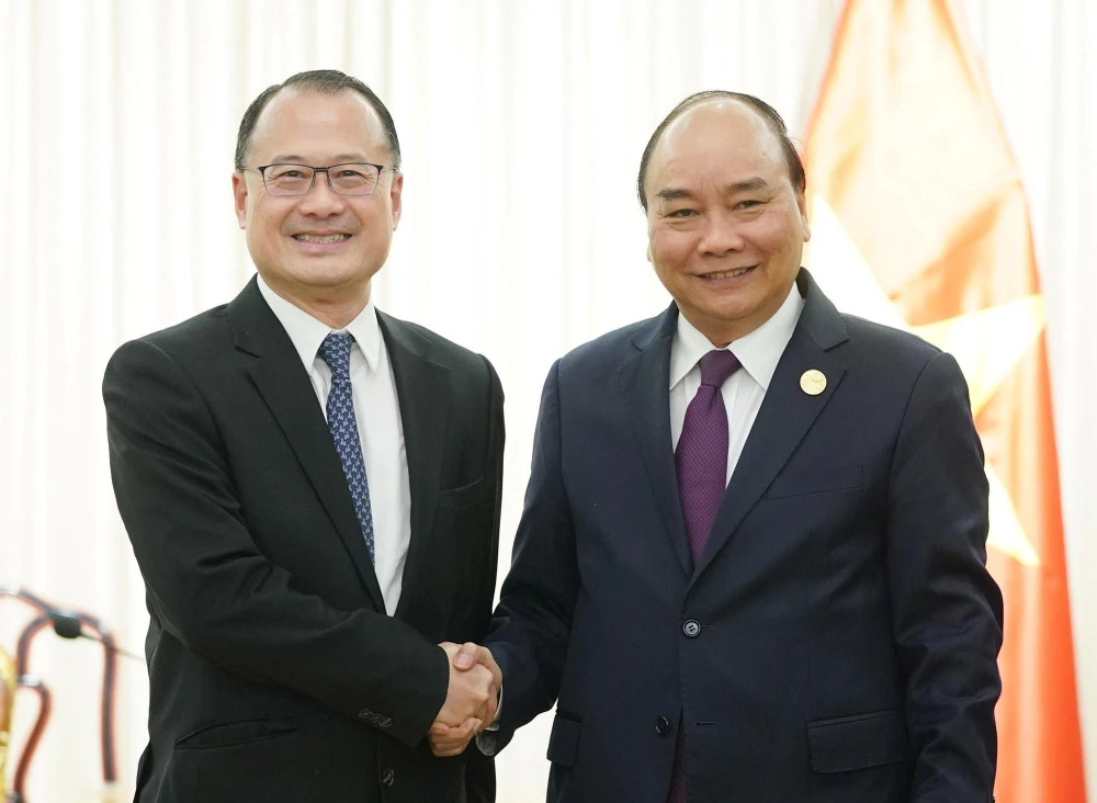 Thủ tướng Nguyễn Xuân Phúc tiếp Chủ tịch Tập đoàn Sunwah của Hongkong-Trung Quốc, ông Jonathan Choi. (Ảnh: Thống Nhất/TTXVN)