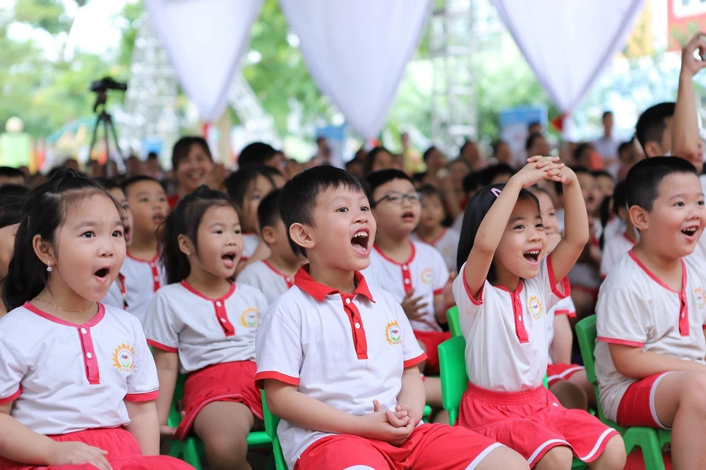 Các em học sinh tại Thanh Hóa hào hứng tham gia chương trình văn nghệ chào mừng Lễ phát động Ngày vi chất dinh dưỡng năm 2019. (Nguồn: Vietnam+)