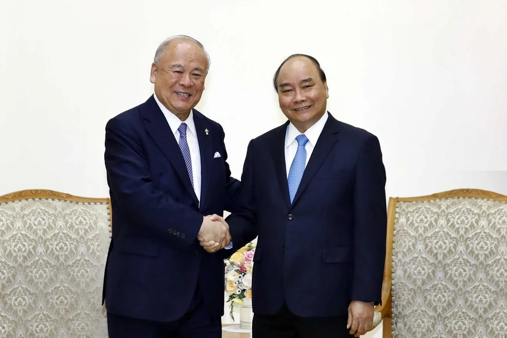 Thủ tướng Nguyễn Xuân Phúc tiếp ông Tsutomu Takebe, Cố vấn Đặc biệt Liên minh Nghị sỹ Hữu nghị Nhật-Việt. (Ảnh: Thống Nhất/TTXVN)