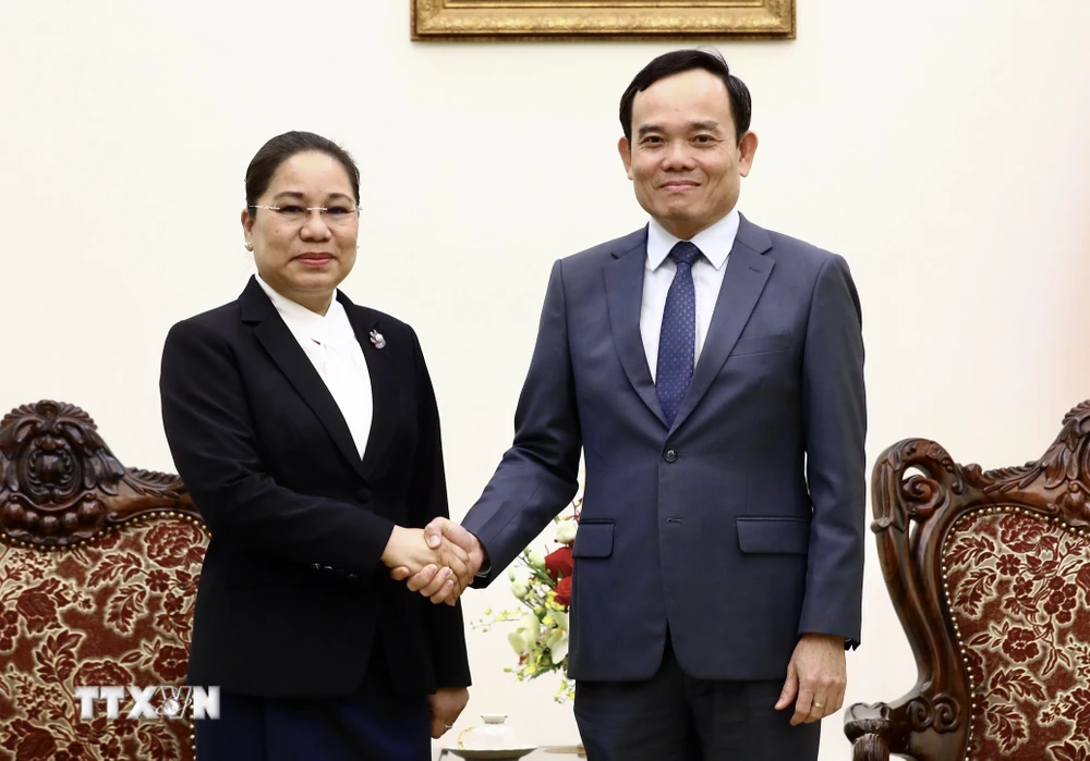 Phó Thủ tướng Trần Lưu Quang tiếp Bộ trưởng Bộ Thông tin, Văn hóa và Du lịch Lào. (Ảnh: Lâm Khánh/TTXVN)