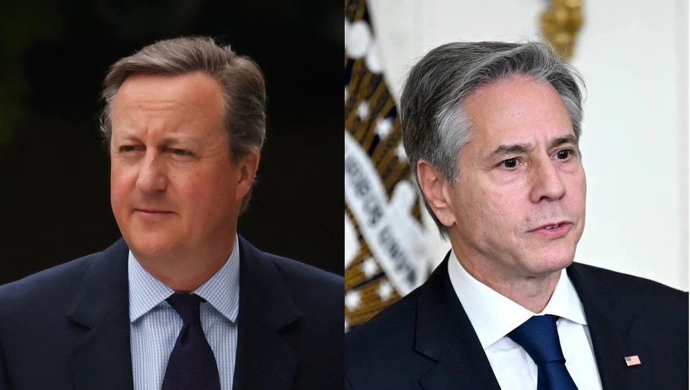 Ngoại trưởng Anh David Cameron và người đồng cấp Mỹ Antony J. Blinken. (Nguồn: AFP/TTXVN)