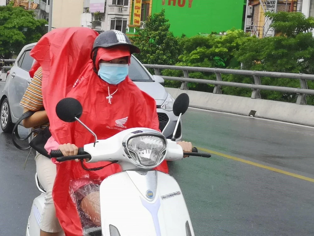 Thủ đô Hà Nội, có mưa, mưa rào và có nơi có dông. (Ảnh: Thanh Tùng/TTXVN)