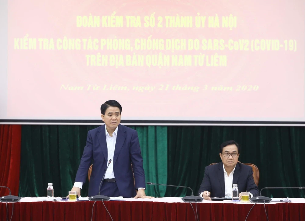 Phó Bí thư Thành ủy, Chủ tịch Ủy ban Nhân dân thành phố Hà Nội Nguyễn Đức Chung phát biểu chỉ đạo tại cuộc làm việc với lãnh đạo quận Nam Từ Liêm. (Ảnh: Văn Điệp/TTXVN)