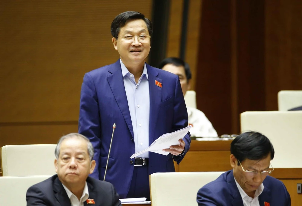 Tổng Thanh tra Chính phủ Lê Minh Khái trả lời chất vấn của các đại biểu Quốc hội. (Ảnh: Doãn Tấn/TTXVN)
