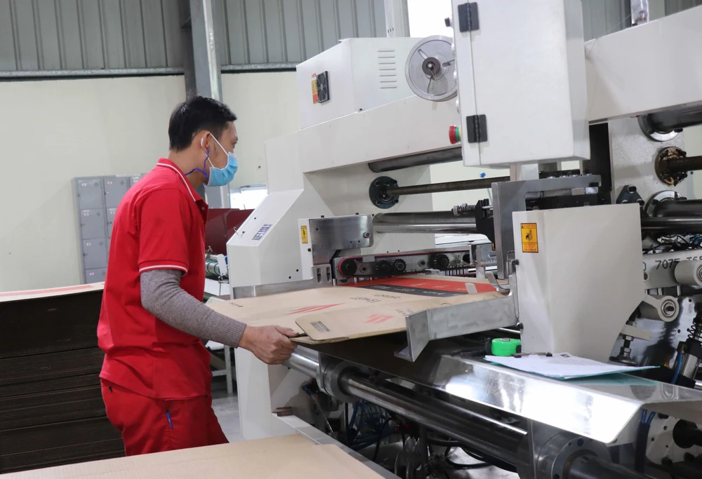 Sản xuất tại Công ty TNHH Trần Thành, khu công nghiệp Tiên Sơn, huyện Tiên Du, tỉnh Bắc Ninh. (Ảnh: Thái Hùng/TTXVN)
