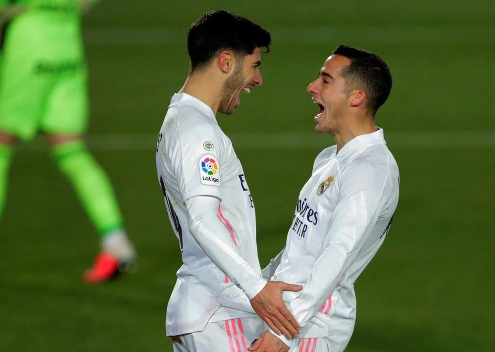 Lucas Vazquez và Marco Asensio mang chiến thắng về cho Real. (Nguồn: AP)