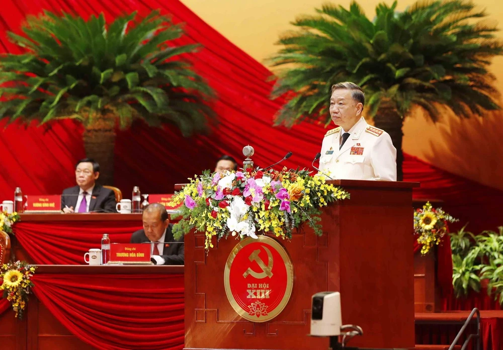 Đại tướng Tô Lâm, Ủy viên Bộ Chính trị, Bí thư Đảng ủy Công an Trung ương, Bộ trưởng Bộ Công an trình bày tham luận. (Ảnh: TTXVN)