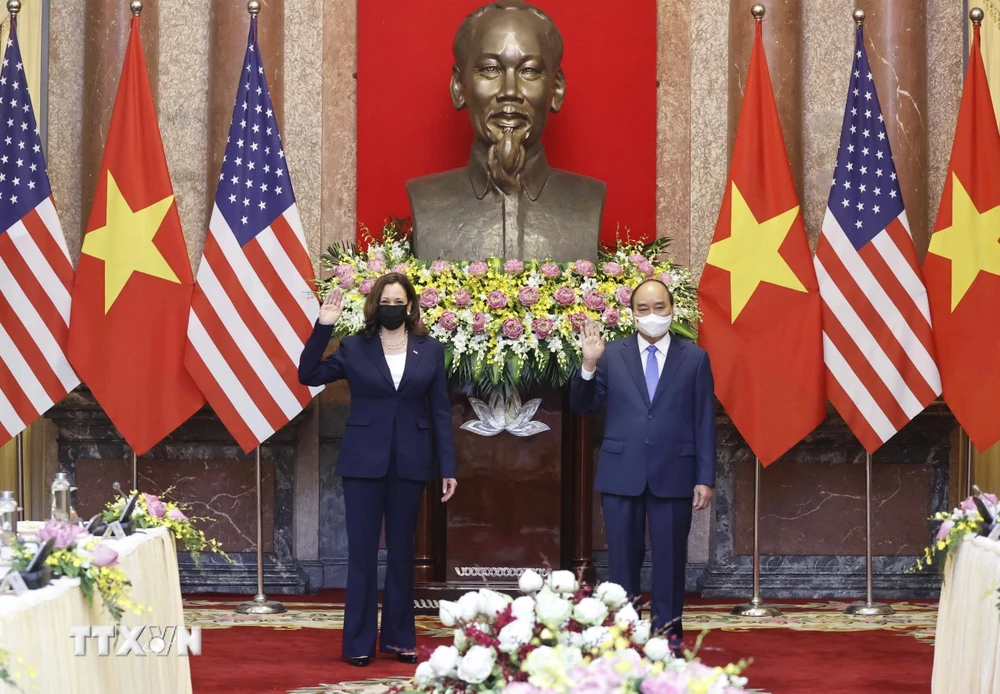 Chủ tịch nước Nguyễn Xuân Phúc và Phó Tổng thống Hoa Kỳ Kamala Harris tại buổi tiếp. (Ảnh: Thống Nhất/TTXVN)