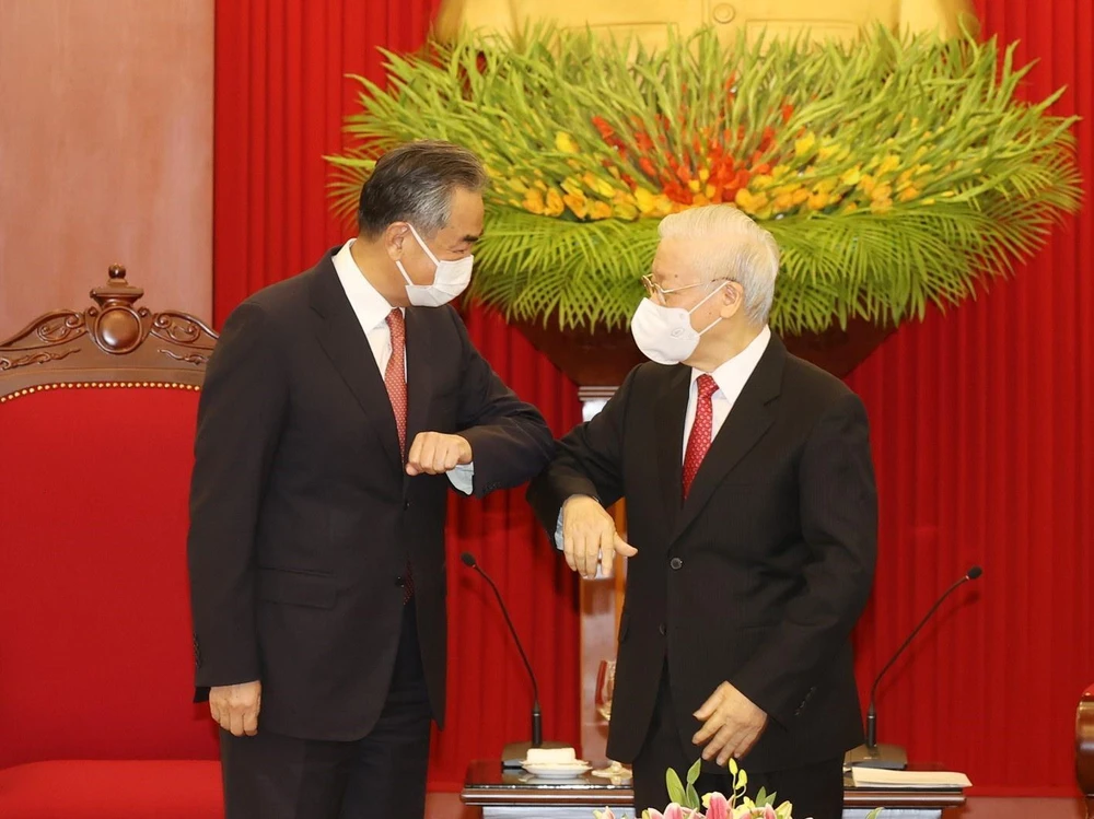 Tổng Bí thư Nguyễn Phú Trọng tiếp Ủy viên Quốc vụ, Bộ trưởng Bộ Ngoại giao Trung Quốc. (Ảnh: Trí Dũng/TTXVN)