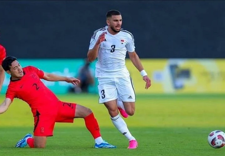 Iraq (áo trắng) trong trận đấu với Hàn Quốc.