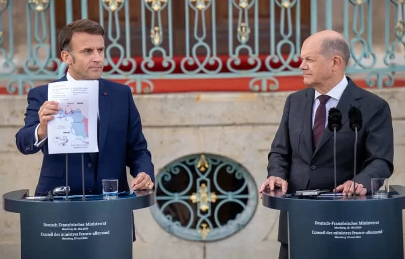 Tổng thống Pháp Emmanuel Macron (trái) và Thủ tướng Đức Olaf Scholz. (Nguồn: dpa)