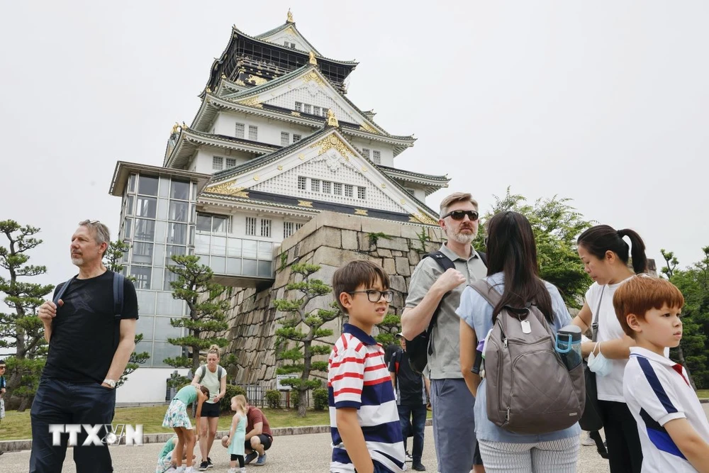 Khách du lịch tại Osaka, Nhật Bản. (Ảnh: Kyodo/TTXVN)