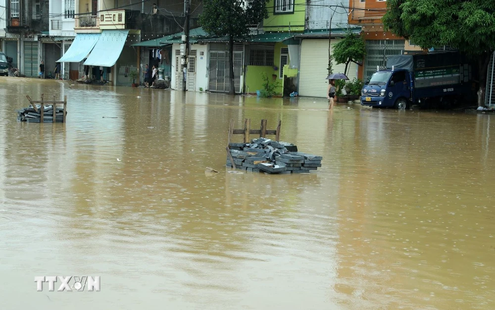 Phường Lào Cai, thành phố Lào Cai chìm trong nước lũ lúc 11g ngày 9/9. (Ảnh: Quốc Khánh/TTXVN)