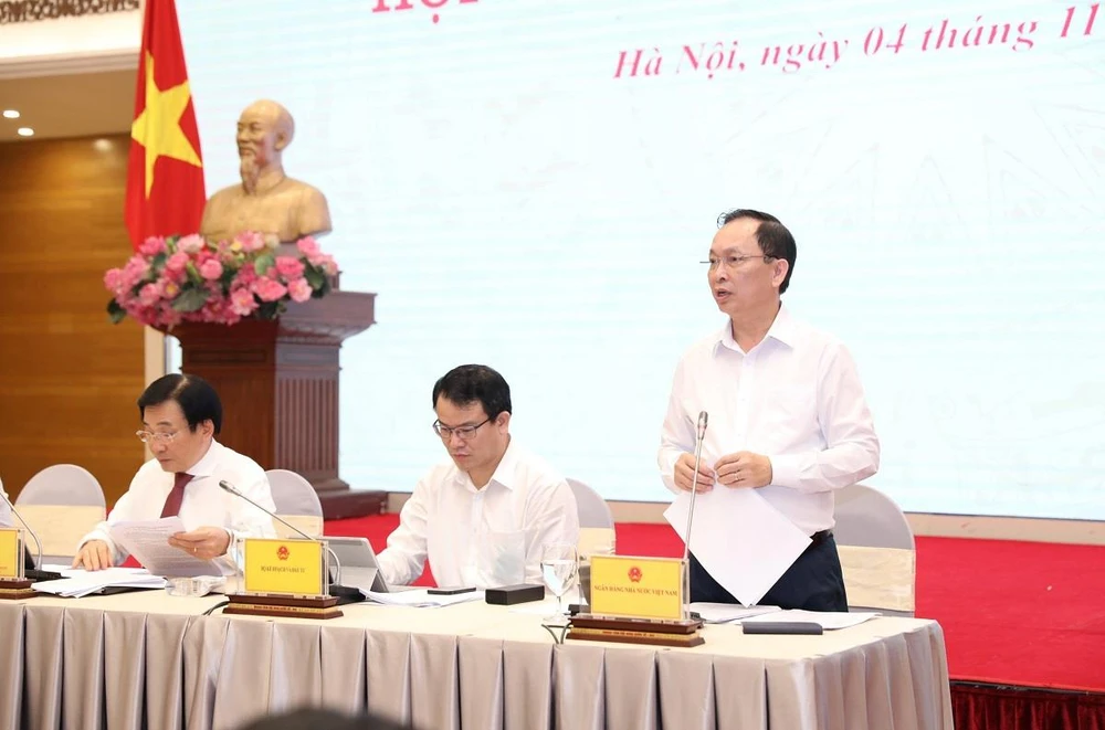 Phó Thống đốc Ngân hàng Nhà nước Đào Minh Tú giải đáp về mức điều chỉnh lãi suất cho vay của các Ngân hàng Thương mại. (Ảnh: PV/Vietnam+)
