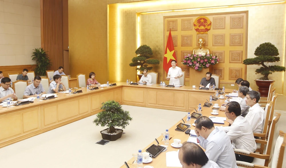 Một cuộc họp của Ban chỉ đạo phòng, chống rửa tiền dưới sự chủ trì của Phó Thủ tướng Vương Đình Huệ. (Ảnh: Lâm Khánh/TTXVN)