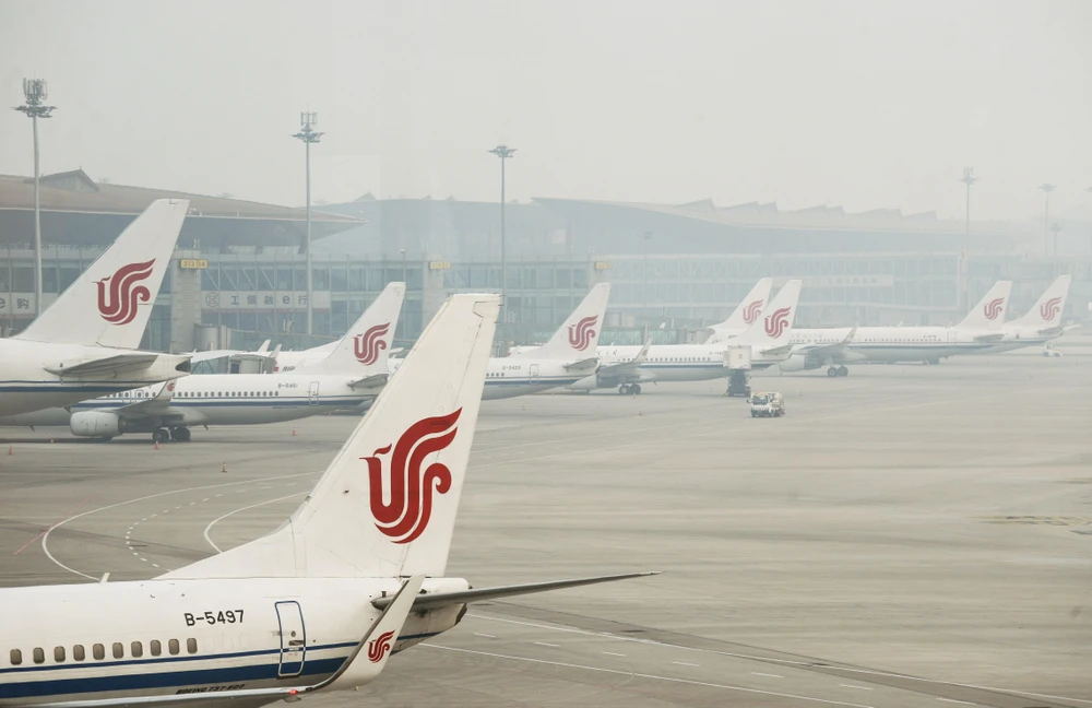 Máy bay của hãng hàng không Air China tại sân bay quốc tế Bắc Kinh, Trung Quốc. (Ảnh: AFP/TTXVN) 