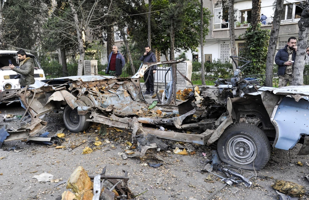 Hiện trường một vụ đánh bom ở Damascus, Syria, ngày 24/1/2019. (Ảnh: AFP/TTXVN) 