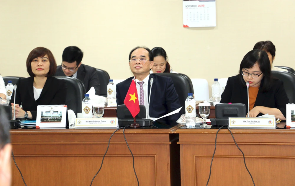Phó tổng Kiểm toán Nhà nước Nguyễn Quang Thành trong cuộc gặp xã giao với đoàn Ủy ban kiểm toán Indonesia. (Ảnh: Hữu Chiến/Vietnam+)