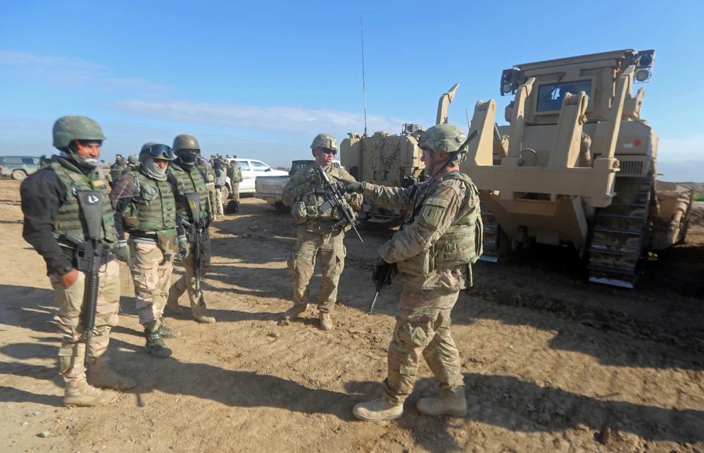 Binh sỹ Mỹ làm nhiệm vụ tại căn cứ quân sự Basmaya, phía đông nam thủ đô Baghdad của Iraq. (Ảnh: AFP/TTXVN)