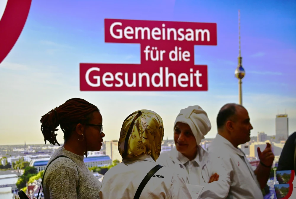 Người dân tham gia hội chợ việc làm dành cho người di cư tại Berlin, Đức, ngày 28/1/2019. (Ảnh: AFP/TTXVN)