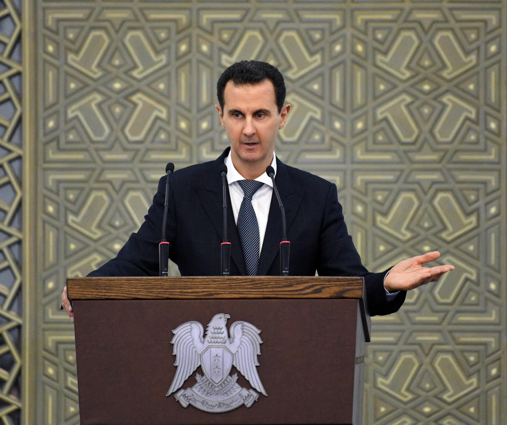 Tổng thống Syria Bashar al-Assad phát biểu tại Damascus. (Ảnh: AFP/ TTXVN)