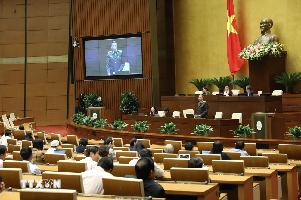 Đại tướng Tô Lâm, Bộ trưởng Bộ Công an giải trình ý kiến của đại biểu Quốc hội nêu. (Ảnh: Văn Điệp/TTXVN)