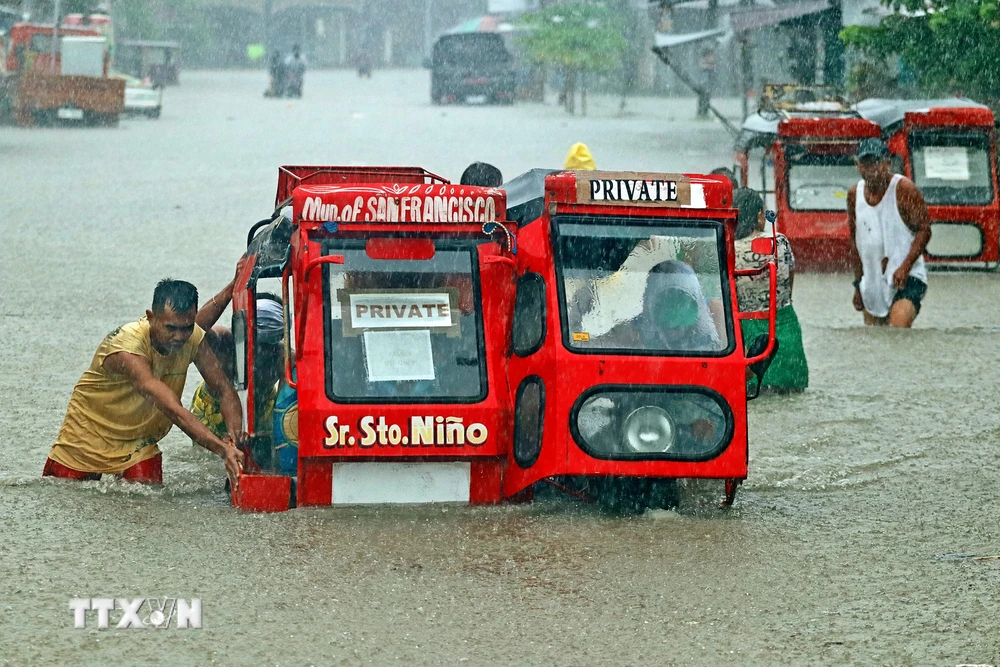 Cảnh ngập lụt sau mưa bão tại thị trấn San Francisco, Mindanao, Philippines ngày 18/12/2020. (Ảnh: AFP/TTXVN)