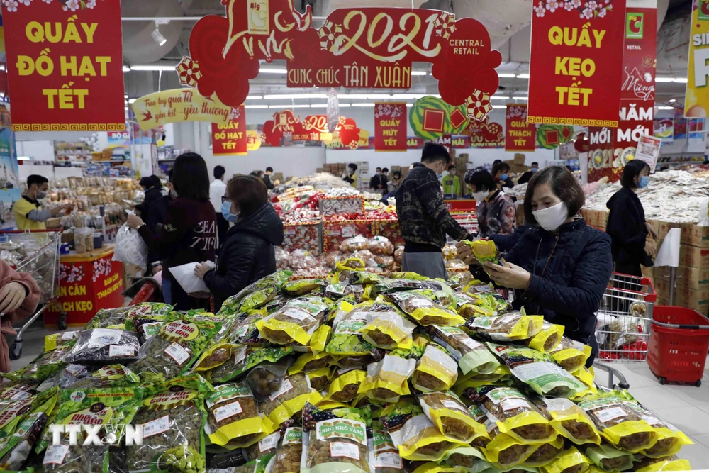 Người dân mua sắm tại siêu thị Big C Thăng Long, Hà Nội. (Ảnh: Trần Việt/TTXVN)