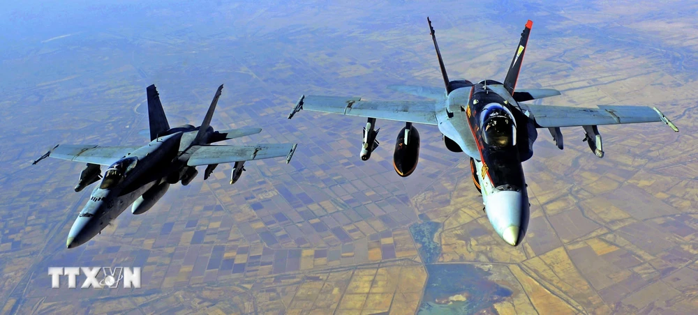 Các máy bay chiến đấu của Mỹ sau khi tiến hành một cuộc không kích. (Ảnh: AFP/TTXVN)