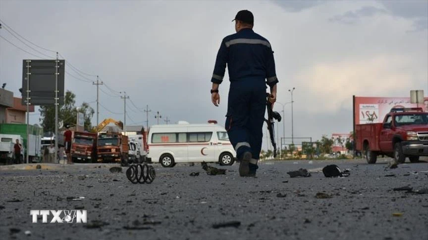 Hiện trường một vụ tấn công tại Baghdad, Iraq. (Ảnh: Anadolu Agency/TTXVN)