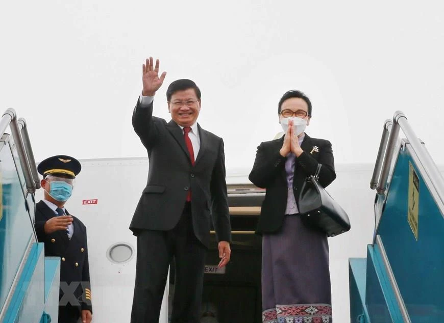 Tổng Bí thư, Chủ tịch nước Lào kết thúc tốt đẹp chuyến thăm hữu nghị chính thức Việt Nam. (Ảnh: Phương Hoa/TTXVN)