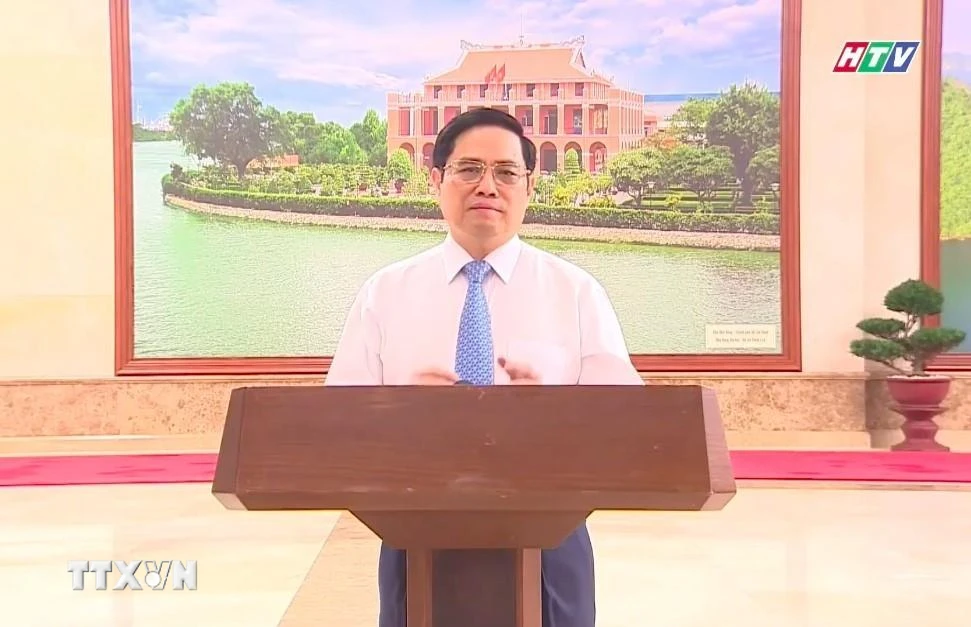 Thủ tướng Chính phủ Phạm Minh Chính phát biểu tại chương trình trực tuyến (ảnh chụp qua màn hình). (Ảnh: Thu Hương/TTXVN)