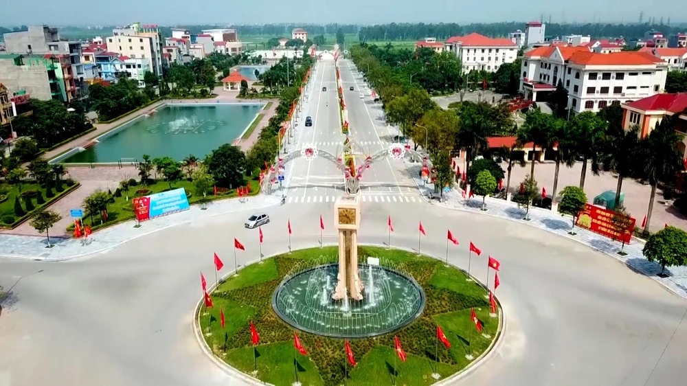 Hạ tầng nông thôn tại huyện Yên Phong, tỉnh Bắc Ninh được đầu tư xây dựng khang trang, hiện đại, công nghiệp và dịch vụ phát triển. (Ảnh: Thái Hùng/TTXVN)