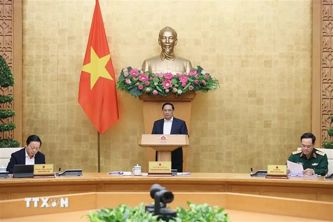 Thủ tướng Phạm Minh Chính chủ trì họp chuyên đề về xây dựng pháp luật tháng 11/2023. (Ảnh: Dương Giang/TTXVN)