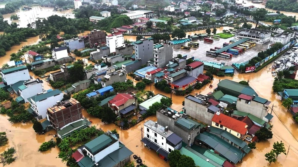 Thành phố Hà Giang bị ngập chìm trong nước sau đợt mưa từ đêm 9/6 đến chiều 10/6 . (Ảnh: TTXVN phát)