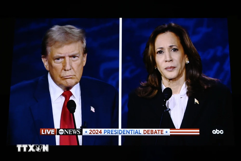 Hai ứng cử viên Tổng thống Mỹ là bà Kamala Harris (phải) và ông Donald Trump. (Ảnh: THX/TTXVN)